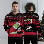 Kansas City Chiefs Grinch Christmas sweater with holiday ugly sweater design and team logo